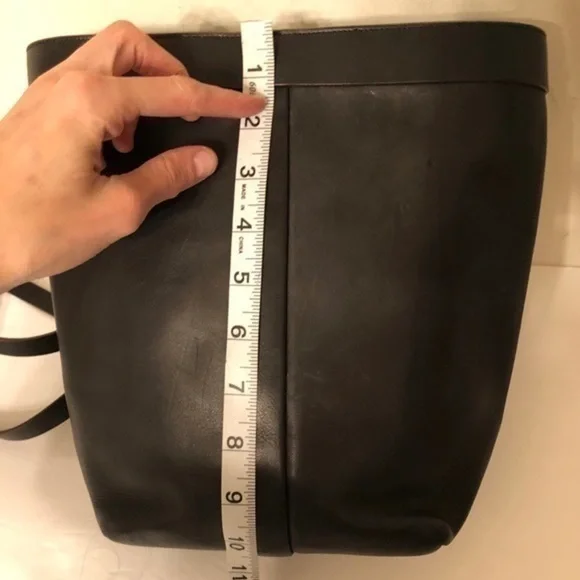 FAUSTO SANTINO black leather sling bag